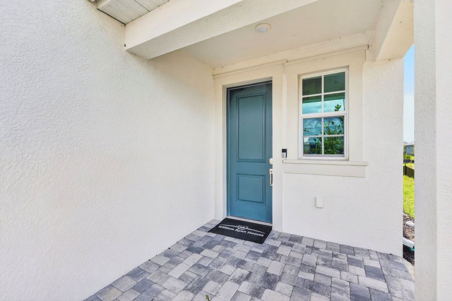 Exterior details and patio area of a home in The Sanctuary – Coastal Collection, Punta Gorda (Image 3). Exterior details and patio area of a home in The Sanctuary – Coastal Collection, Punta Gorda (Image 3).