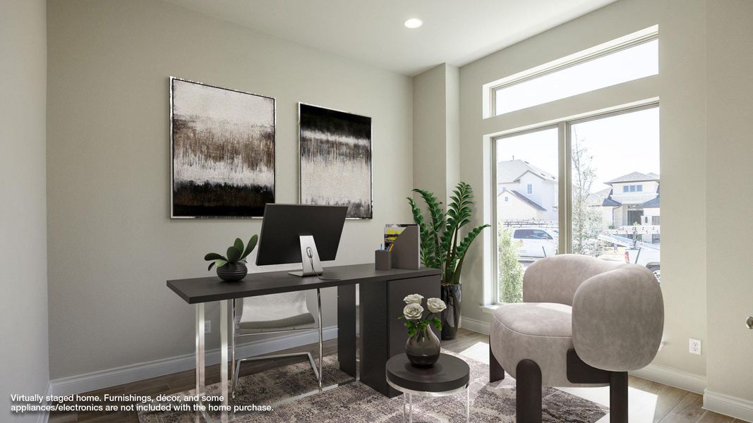 Home office featuring baseboards, recessed lighting, and wood finished floors Home office featuring baseboards, recessed lighting, and wood finished floors