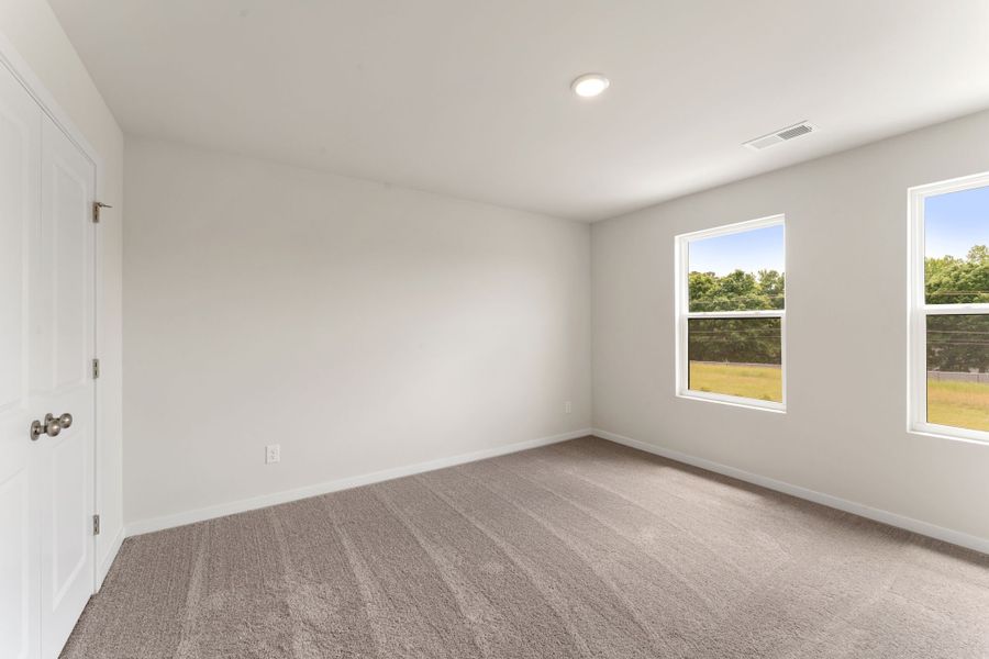 A room with a window and a door. A room with a window and a door.