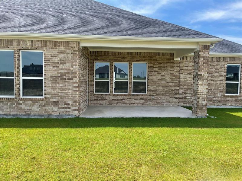 Exterior details and patio area of a home in The Ranch at Stone Hill, Waxahachie (Image 3).