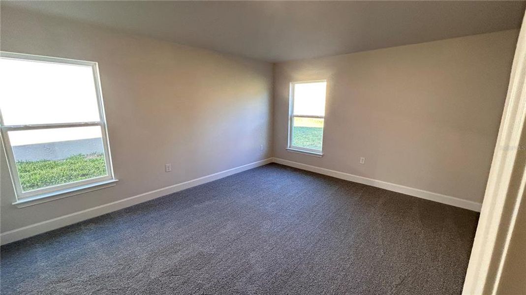 Spacious, unfurnished interior of a new home in Abbey Glen, Dade City (Image 11).