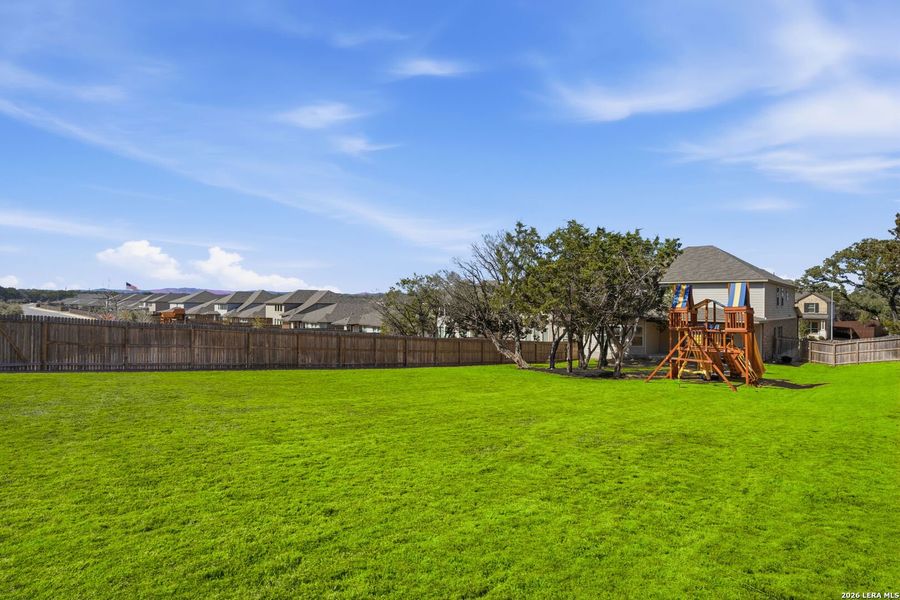 Exterior details and patio area of a home in Fox Falls, Boerne (Image 26).
