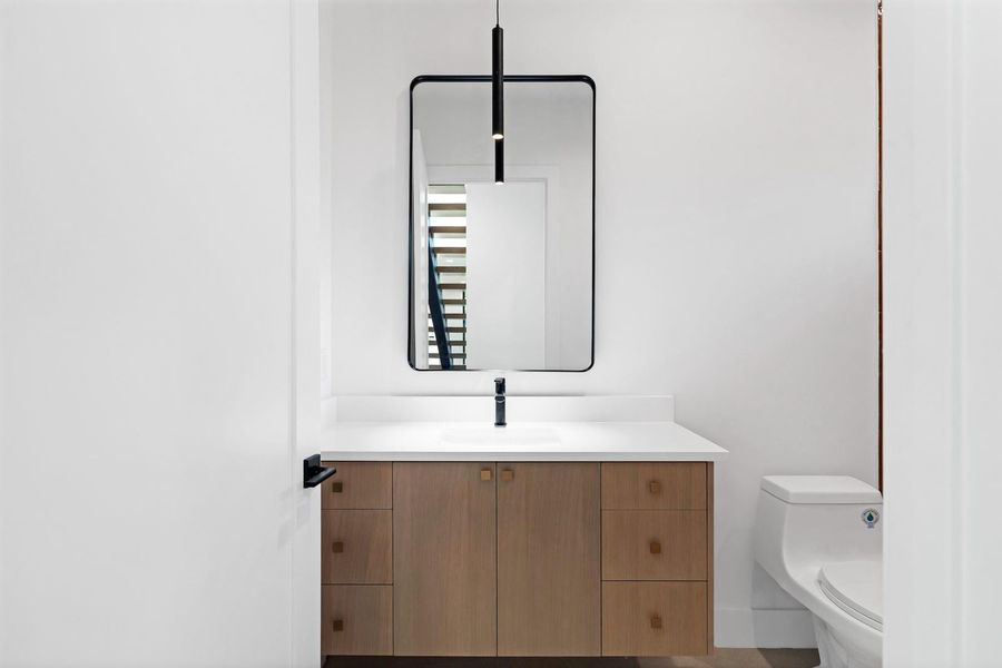 Bathroom with vanity and toilet
