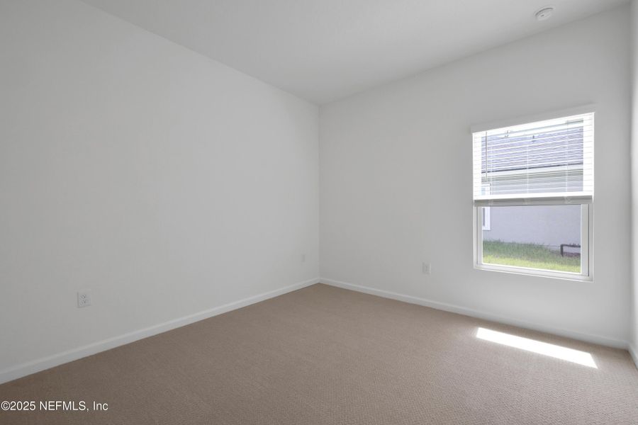 Spacious, unfurnished interior of a new home in Cordova Palms, St. Augustine (Image 10).