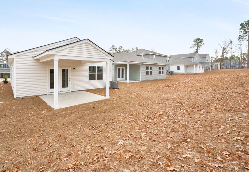 Exterior details and patio area of a home in Grand Arbor, Blythewood (Image 3).