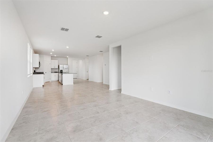 Spacious, unfurnished interior of a new home in Lawson Dunes - Signature Series, Haines City (Image 32).