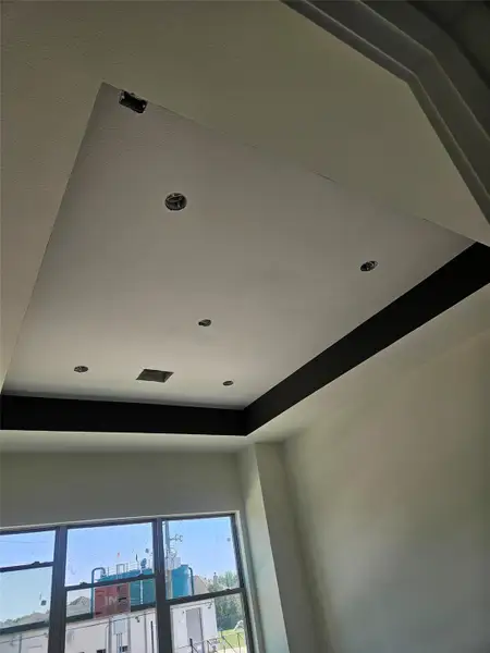 Luxury meets comfort, recessed ceiling with accent trim and lighting adds depth and character to the primary bedroom. Luxury meets comfort, recessed ceiling with accent trim and lighting adds depth and character to the primary bedroom.