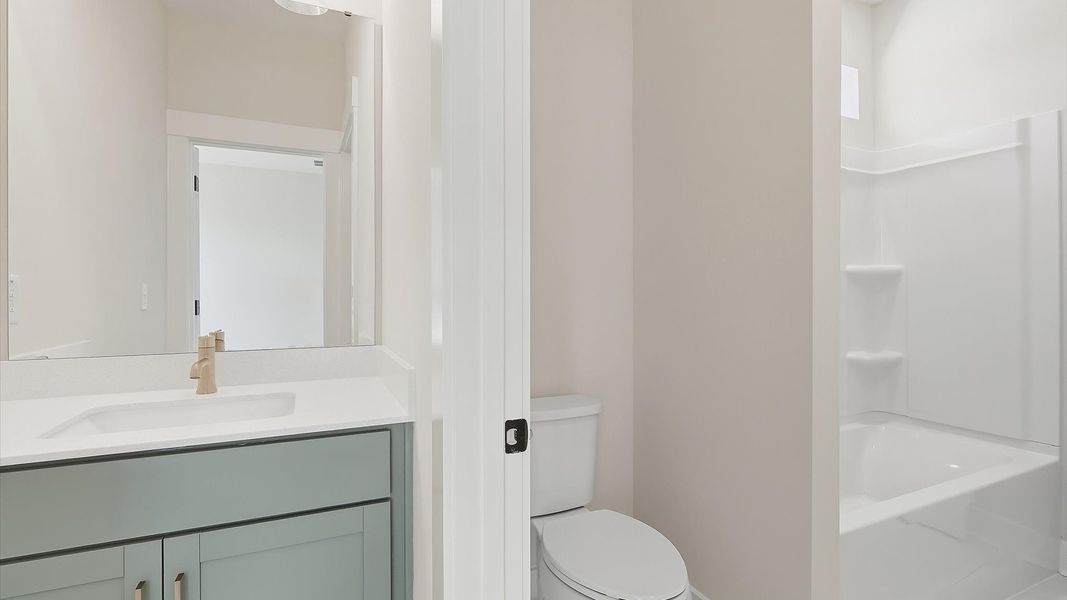 Representative furnished interior of a home built from the Stonehaven  II by DRB Homes in Oak Bend, Charleston (Image 27).