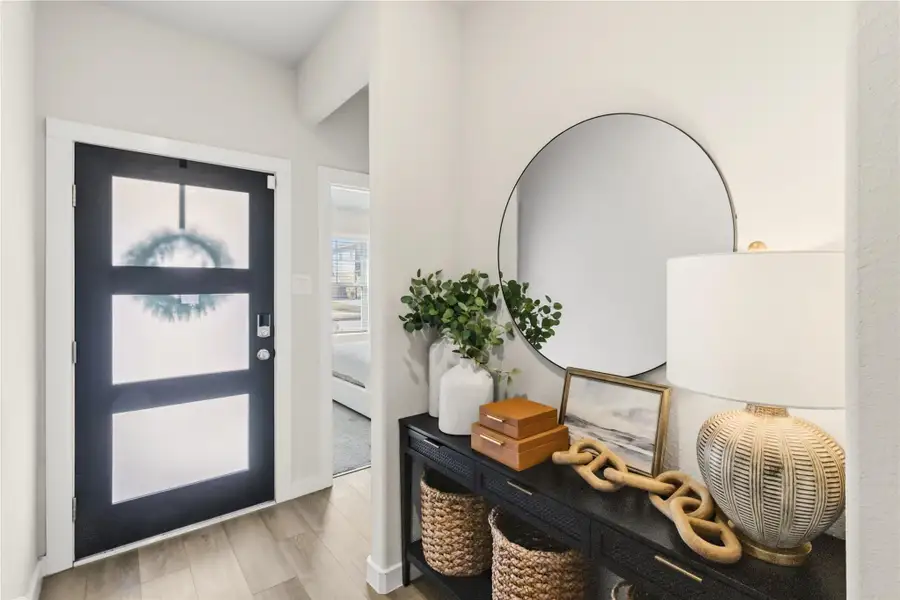 Furnished interior view inside a new home in Heights of Barbers Hill, Mont Belvieu (Image 9).