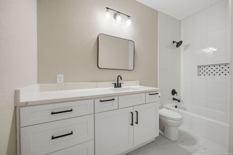 Furnished interior view inside a new home in , Devine (Image 12).