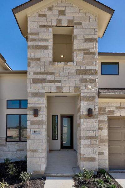 Exterior details and patio area of a home in Lariat, Liberty Hill (Image 3).