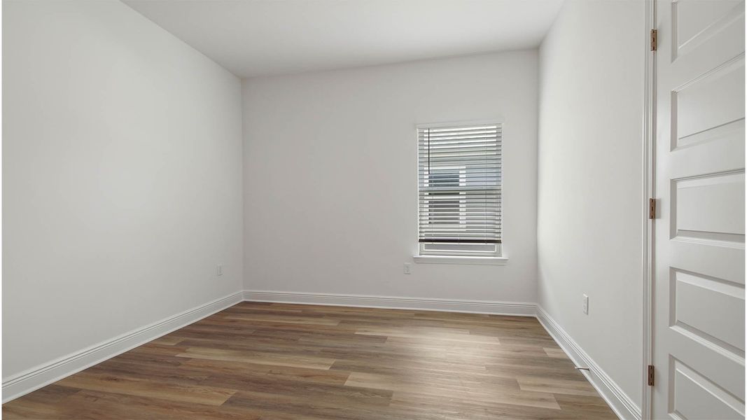 Representative unfurnished interior of a home built from the Delray by D.R. Horton in Caballeros Estates At Hombre, Panama City Beach (Image 24).
