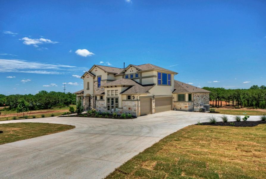 Representative exterior photo of a completed home built from the Madera II by Giddens Homes in Scofield Farms Estates, Georgetown, TX (Image 33).