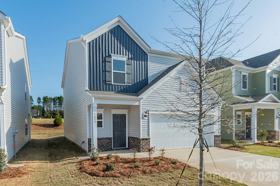 Front exterior of a new home in Country Club Village, Salisbury, NC, highlighting curb appeal (Image 1). Front exterior of a new home in Country Club Village, Salisbury, NC, highlighting curb appeal (Image 1).