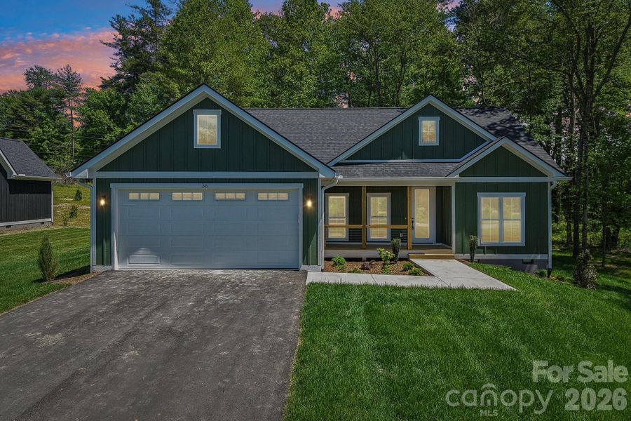 Front exterior of a new home in , Hendersonville, NC, highlighting curb appeal (Image 23).