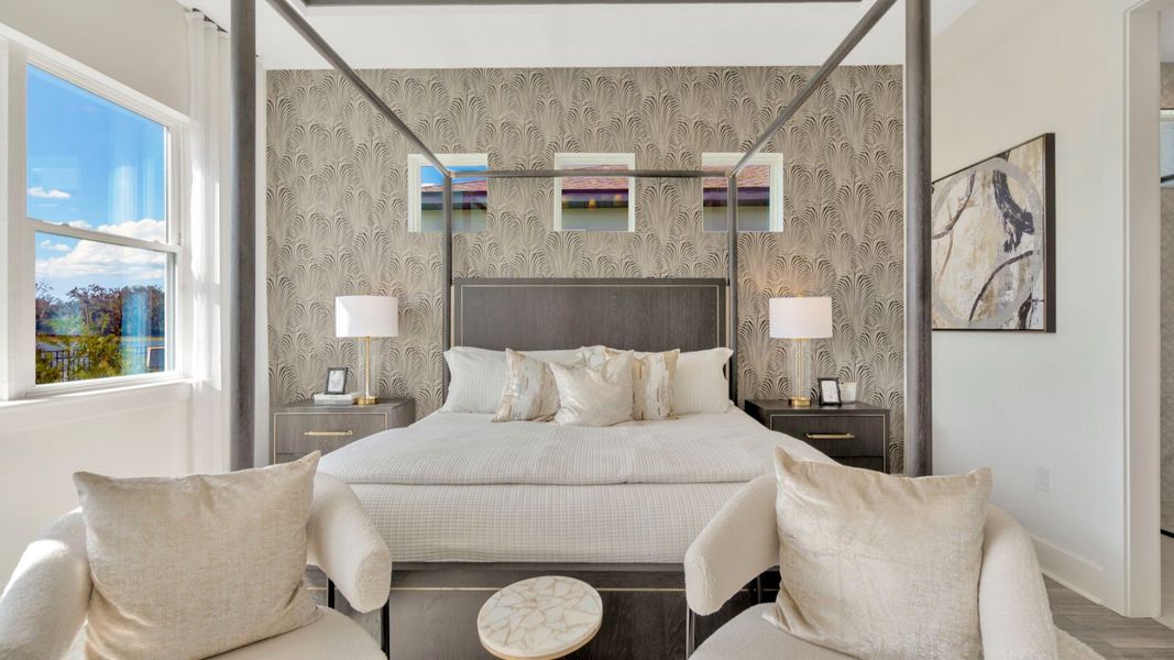 The Primary Bedroom of a DRB Homes Grand Eider model, which is a home plan offered at Serengeti in Spring Hill, FL.