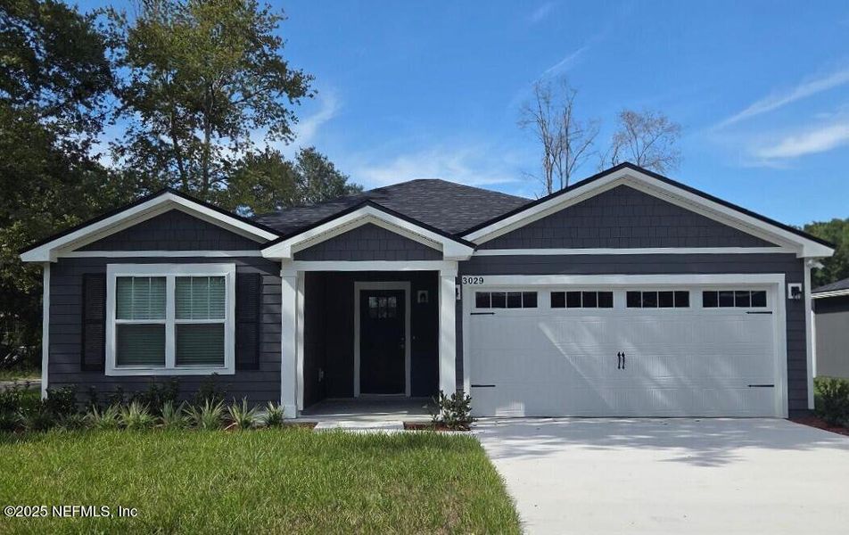Front exterior of a new home in , Jacksonville, FL, highlighting curb appeal (Image 2).