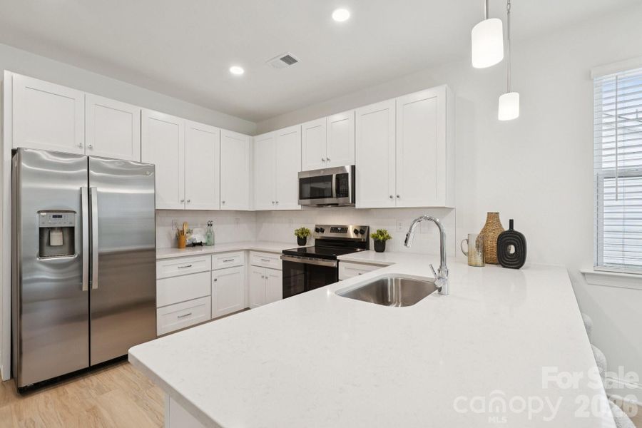 Furnished interior view inside a new home in , Monroe (Image 11).