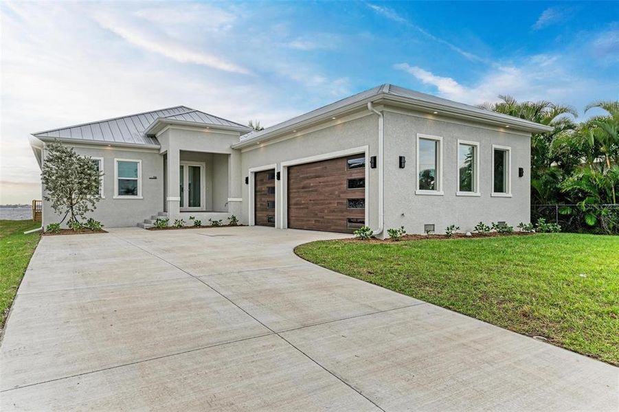Front exterior of a new home in , Punta Gorda, FL, highlighting curb appeal (Image 19). Front exterior of a new home in , Punta Gorda, FL, highlighting curb appeal (Image 19).