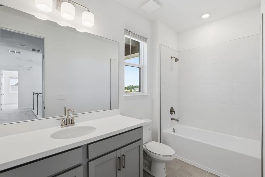 Representative furnished interior of a home built from the Ashwood by Taylor Morrison in Center Lake Ranch Community Group Page, St. Cloud (Image 9).