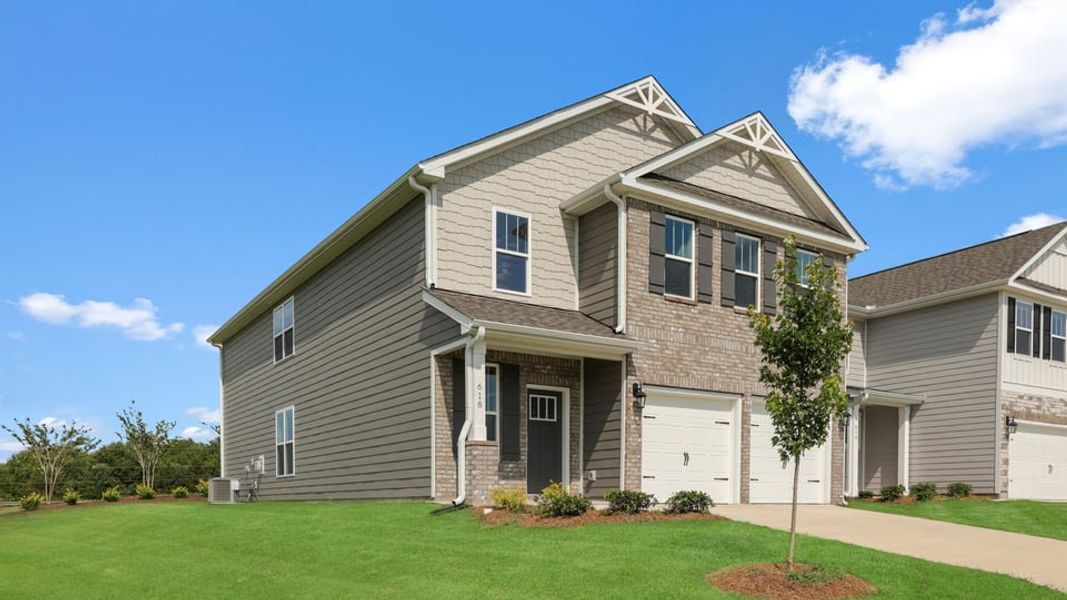 Front exterior of a new home in Adams Glen, Greenville, SC, highlighting curb appeal (Image 2). Front exterior of a new home in Adams Glen, Greenville, SC, highlighting curb appeal (Image 2).