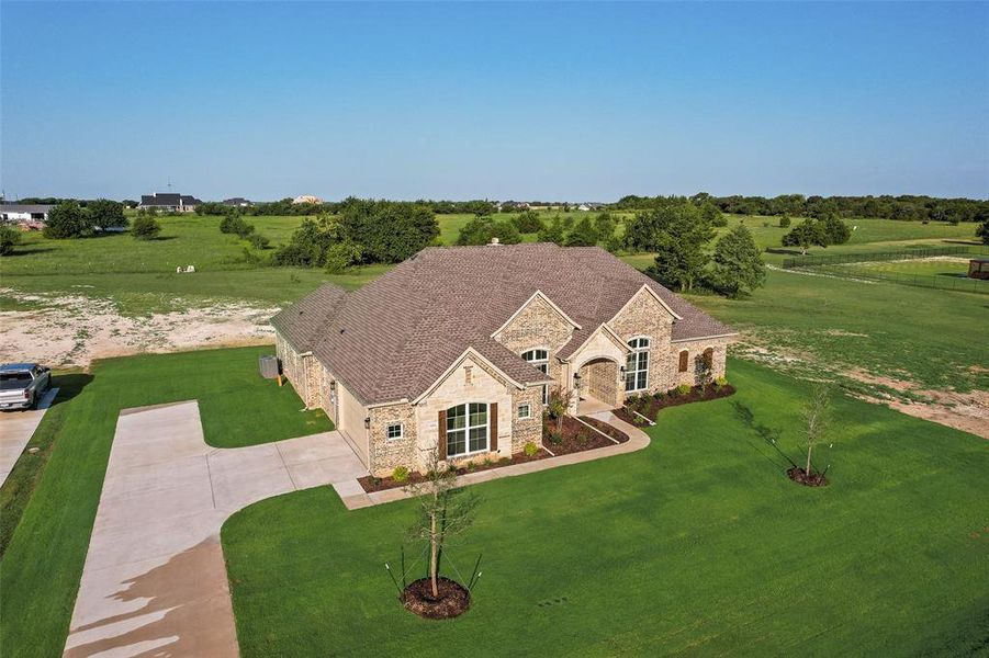 Front exterior of a new home in , Midlothian, TX, highlighting curb appeal (Image 16).