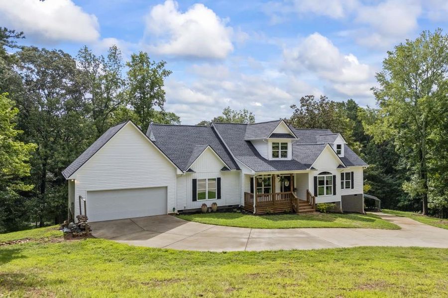 Front exterior of a new home in , Dawsonville, GA, highlighting curb appeal (Image 1). Front exterior of a new home in , Dawsonville, GA, highlighting curb appeal (Image 1).