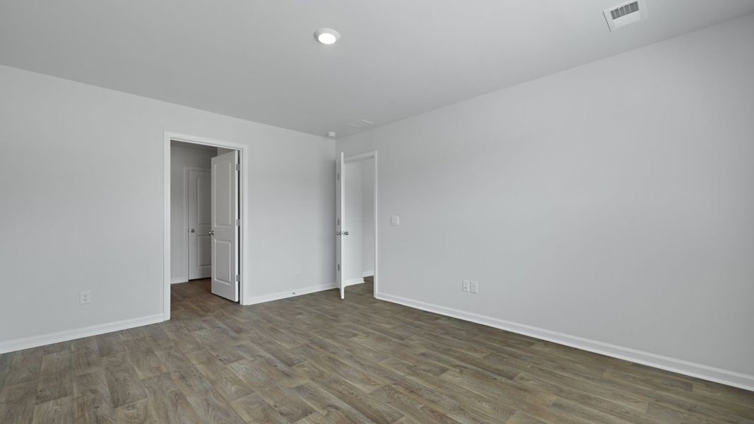Representative unfurnished interior of a home built from the CALI by D.R. Horton in Evergreen, Holly Hill (Image 23). Representative unfurnished interior of a home built from the CALI by D.R. Horton in Evergreen, Holly Hill (Image 23).