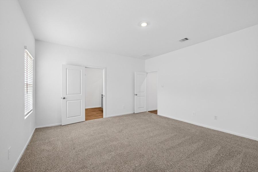 Spacious, unfurnished interior of a new home in Grand Pines, Magnolia (Image 20).