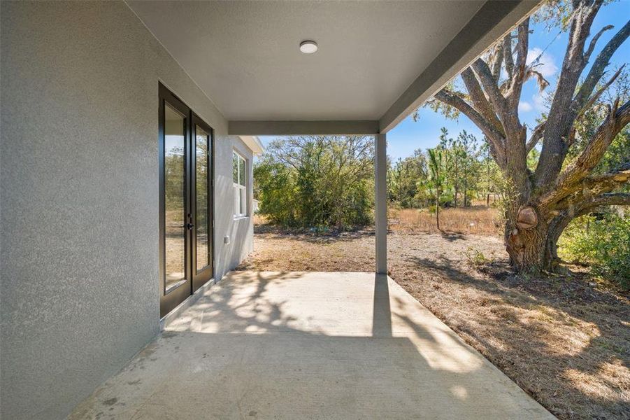 Exterior details and patio area of a home in , Citrus Springs (Image 37).