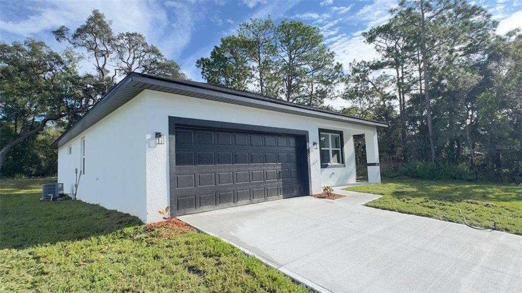 Front exterior of a new home in , Citrus Springs, FL, highlighting curb appeal (Image 1). Front exterior of a new home in , Citrus Springs, FL, highlighting curb appeal (Image 1).