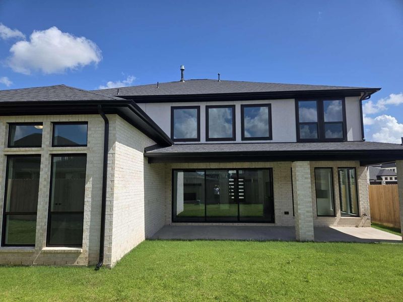 Exterior details and patio area of a home in , Richmond (Image 25).