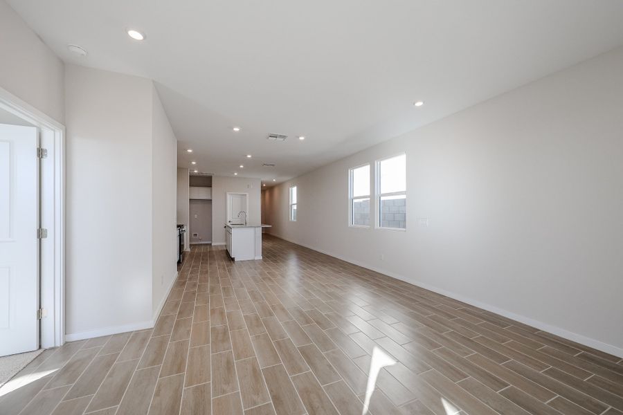 A long hallway with white walls. A long hallway with white walls.