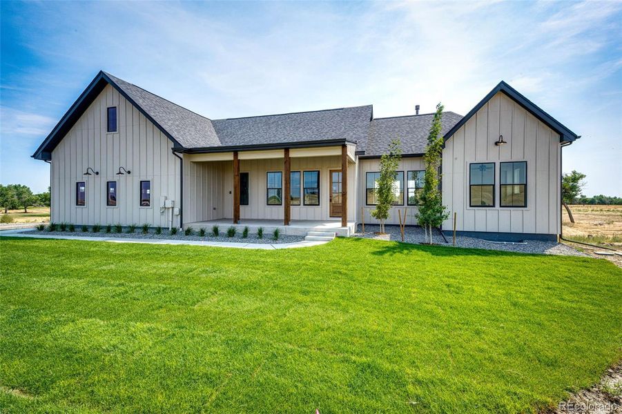 Front exterior of a new home in , Byers, CO, highlighting curb appeal (Image 26).