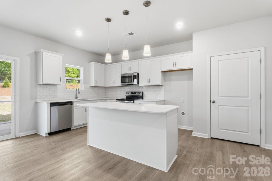Furnished interior view inside a new home in Piper Creek, Newton (Image 14).