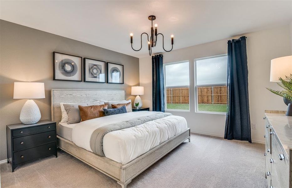 Spacious owner's suite with private bath