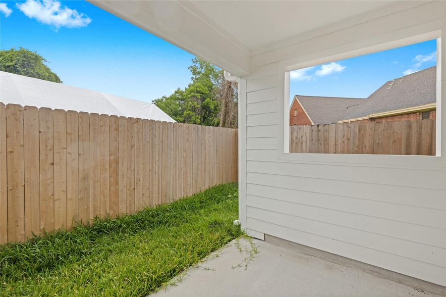 Exterior details and patio area of a home in , Houston (Image 3). Exterior details and patio area of a home in , Houston (Image 3).
