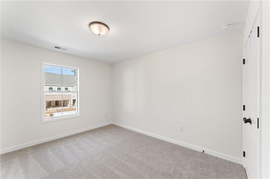 Spacious, unfurnished interior of a new home in River Walk Place, Lawrenceville (Image 14).