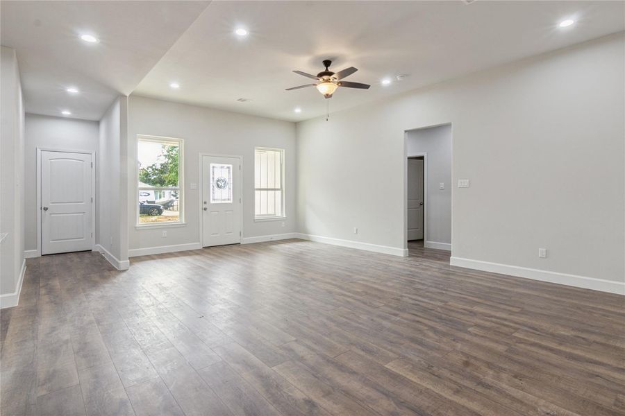 This inviting entrance offers easy access to the garage on the left and cozy 3 bedrooms on the right.