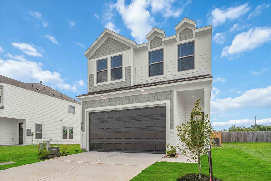 Front exterior of a new home in Cay Landing, Houston, TX, highlighting curb appeal (Image 3). Front exterior of a new home in Cay Landing, Houston, TX, highlighting curb appeal (Image 3).