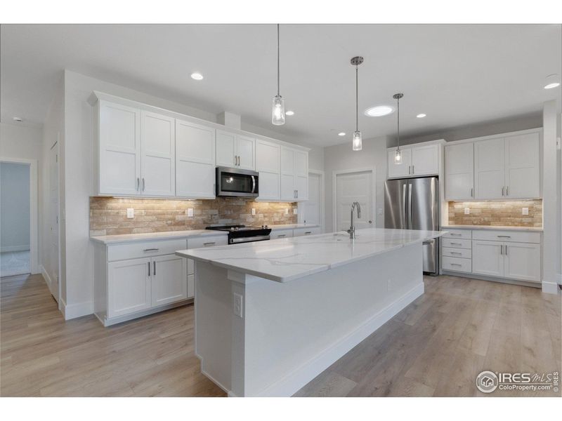 Furnished interior view inside a new home in Cottages at Kelly Farm, Greeley (Image 17).