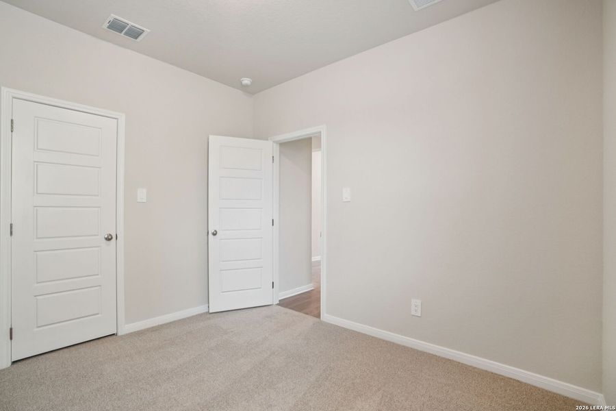 Spacious, unfurnished interior of a new home in Royal Crest, San Antonio (Image 29).