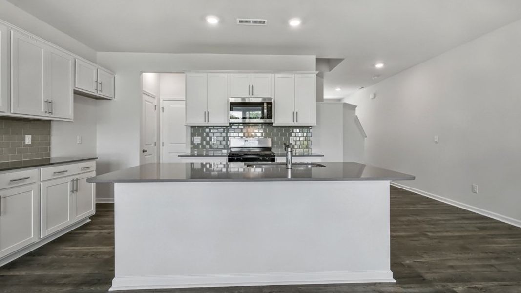 Furnished interior view inside a new home in Chapel Townes, Raleigh (Image 10). Furnished interior view inside a new home in Chapel Townes, Raleigh (Image 10).