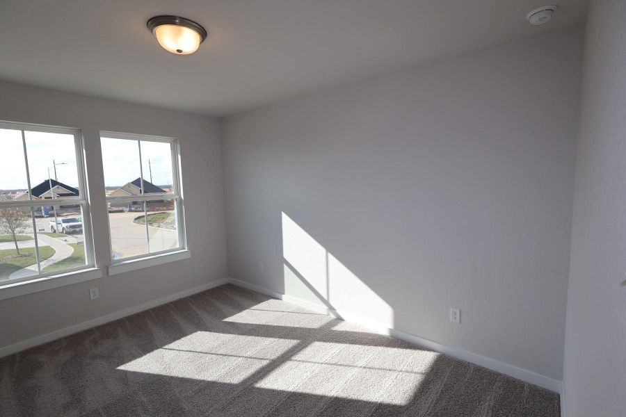 Spacious, unfurnished interior of a new home in The Timbers at Mason Woods, Cypress (Image 13).