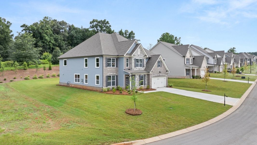 Representative exterior photo of a completed home built from the Westerly by D.R. Horton in Haven Abbey, Cumming, GA (Image 2).