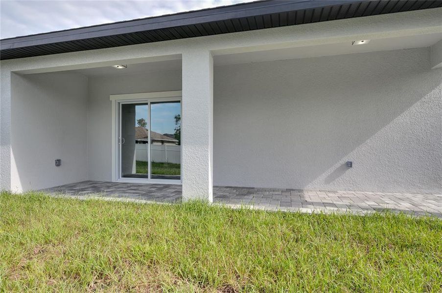 Exterior details and patio area of a home in , Deltona (Image 24).