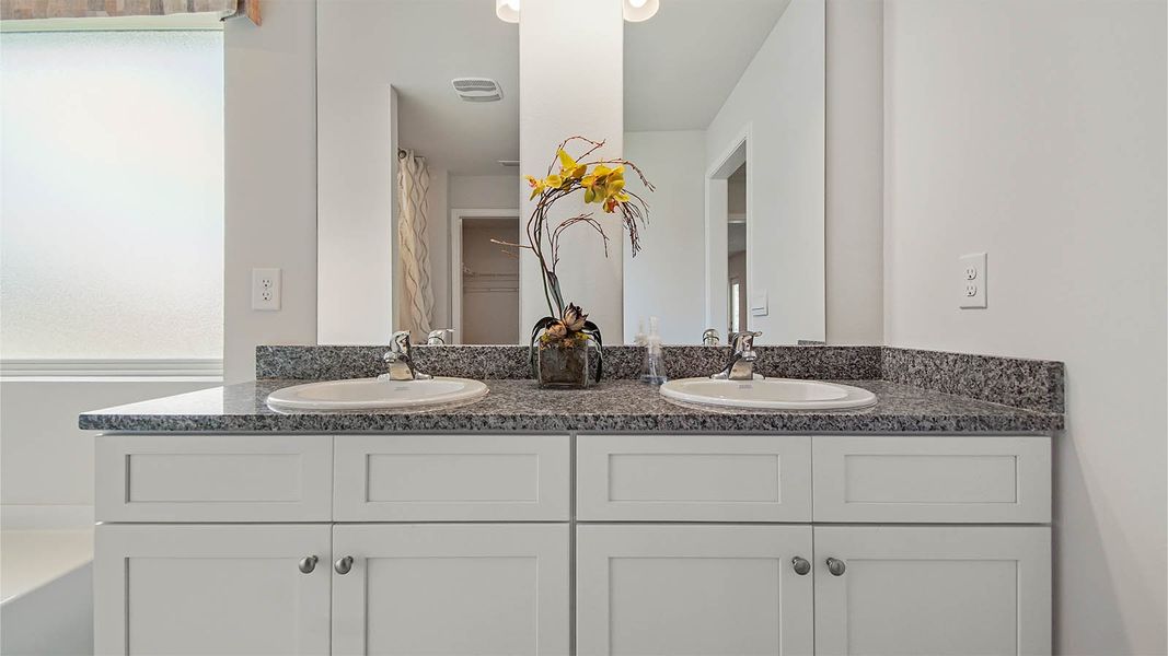 Representative furnished interior of a home built from the Cali by D.R. Horton in Owl's Head East, Freeport (Image 19).