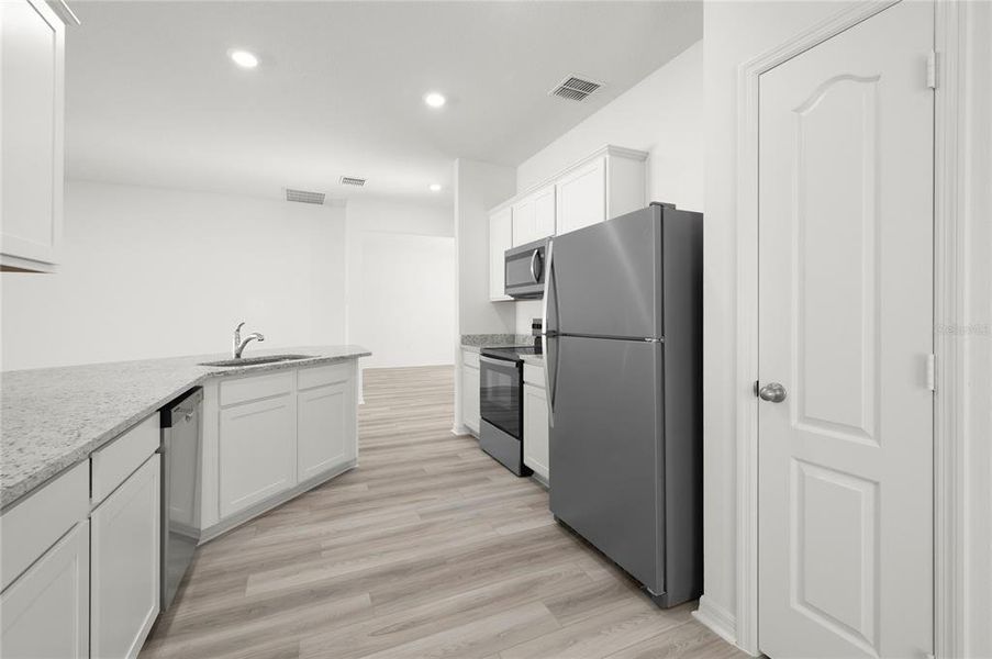 Furnished interior view inside a new home in Tula Parc, Astatula (Image 6). Furnished interior view inside a new home in Tula Parc, Astatula (Image 6).