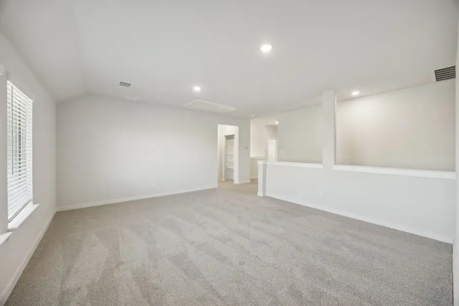 Primary Suite in the Wimbledon home plan by Trophy Signature Homes – REPRESENTATIVE PHOTO Primary Suite in the Wimbledon home plan by Trophy Signature Homes – REPRESENTATIVE PHOTO