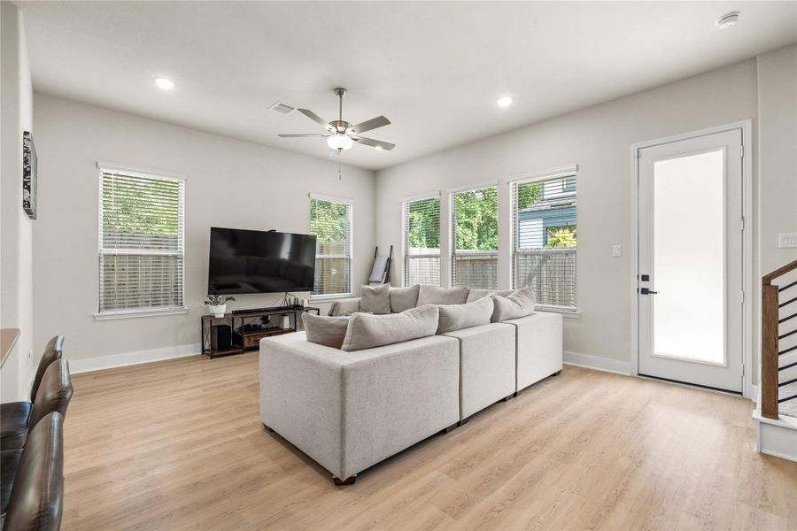 Positioned on a corner lot, the home benefits from additional windows and abundant natural light, creating a living space that feels bright, open, and inviting throughout the day.
